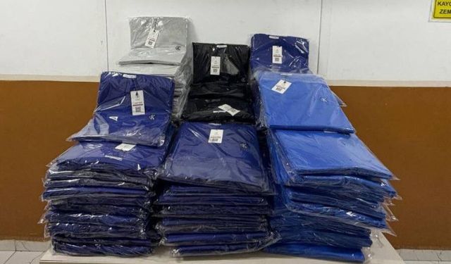 Ünlü markalara ait piyasa değeri 3 milyon 125 bin TL  olan giyim malzemesi ele geçirildi
